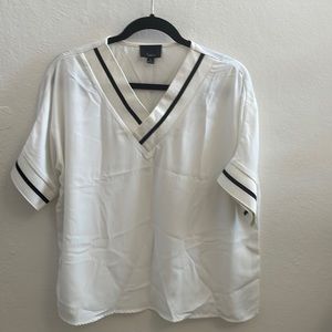 Lumiere blouse size small. White with a black stripped collar